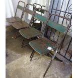 4 industrial metal folding chairs, 2 chairs impressed Mannolkar.Co., the other 2 impressed 5CG5