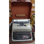 A Vintage Olivetti Studio 44 portable typewriter with case