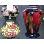 A Moorcroft tube-lined vase, 67/150, and a Vintage Moorcroft vase