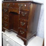 A 19th century mahogany Queen Anne style writing desk of small size, with 1 long and 3 short