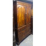 A 19th century mahogany and satinwood-strung linen press, lacking slides, the base having 2 dummy