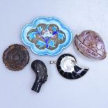 A silver fossil pendant, carved shell, Oriental carved item, and an enamel dish etc