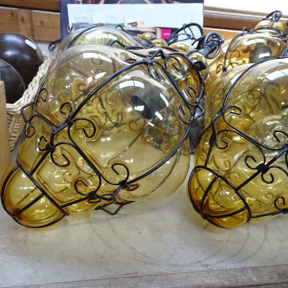 A set of 4 amber glass wirework encased lanterns, height 32cm overall - Image 2 of 2
