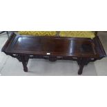 An Oriental hardwood alter table, with pierced and carved frieze, L130cm