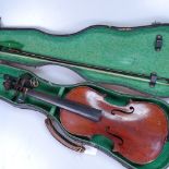 A 1920's 3/4 size violin and bow in case