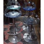 A set of 4 modern coloured plastic and chrome rise and fall bar stools