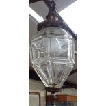 A glass lantern with embossed metal mounts, height 44cm approx
