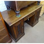 A Victorian walnut knee-hole writing desk, with single drawer, flanked by acanthus leaf carved panel