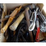 A box of various carpentry tools