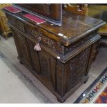 An Antique Continental chiffoniere base, with 2 frieze drawers above figural carved panelled