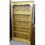 A modern pine floor standing open bookcase, W95cm, H180cm