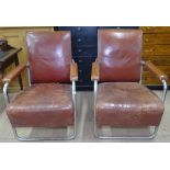 A pair of mid-century leather and steel armchairs, in the manner of Pel