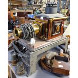 An Antique Ross brass-mounted mahogany Magic Lantern, and accessories