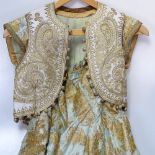 An Oriental gold thread embroidered waistcoat, and an Oriental tunic