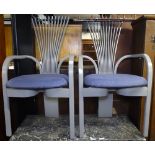 A pair of Norwegian Totem armchairs, by Torstein Nilsen for Westnofa, 1 retaining maker's paper