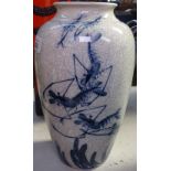 An Oriental crackle glaze blue and white vase, 25cm
