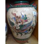 An Oriental incised and painted vase with dragon decoration, 16.5"