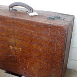 A crocodile skin suitcase, monogrammed AGB length 60cm