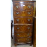 A reproduction mahogany bow-front chest on chest, H132cm, W55cm