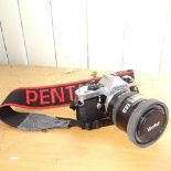 Pentax ME Super 35mm camera with 50mm lens, instructions, flash unit etc, 2 other lenses, and 3