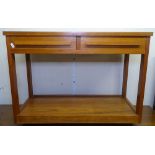 A small Danish teak side table, with 2 frieze drawers, W78cm, H57cm