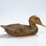 An Antique carved wood duck, length 25cm