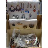 A collection of costume brooches, earrings, bangles, necklaces etc
