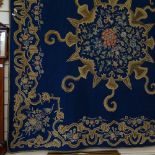 An Antique Oriental embroidered wall hanging, width 160cm