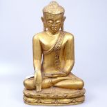 A 19th century Burmese carved and gold lacquered Buddha, 37cm