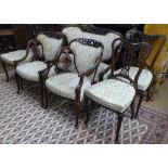 An Edwardian mahogany parlour suite, comprising bow-arm 2-seater settee, 2 elbow chairs, and 4