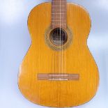 A Dulcet Classic acoustic guitar