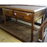 A low oak coffee table with 2 frieze drawers, W76cm, H46cm