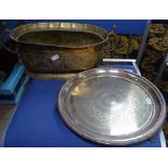 A silver plated engraved salver, and a brass wine cooler