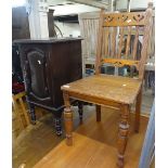 A Victorian Gothic oak hall chair, a walnut pot cupboard, and a mahogany bedside cupboard