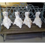 A set of 4 large Victorian painted cast-iron bath feet