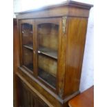 A 19th century walnut pier cabinet, with 2 glazed doors, marquetry decoration, and ormolu mounts,