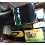 Polaroid cameras, and other photographic equipment