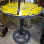 A distressed industrial design pedestal table, H82cm