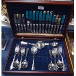 A part canteen of Sheffield stainless steel "Excalibur" cutlery, in fitted mahogany case