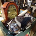 A box with a teapot, clocks etc