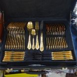 A cased Solingen gold plated canteen of cutlery for 12 people, in fitted case