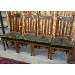 A set of 4 Art Nouveau walnut dining chairs, with original decorative seats