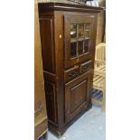An Antique Continental oak cupboard, with glazed and panelled doors, W90cm, H154cm
