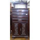 An Art Nouveau mahogany 4-drawer music cabinet, with raised mirror-back, W47cm