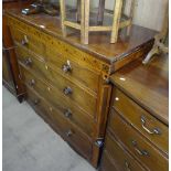 A Regency mahogany and marquetry decorated chest of 2 short and 3 long drawers (lacking feet),