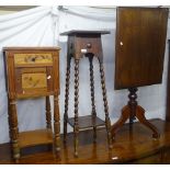 An Edwardian pitch pine bedside cupboard, an oak jardiniere stand, and a mahogany tilt-top