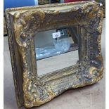 A gilt-gesso framed wall mirror