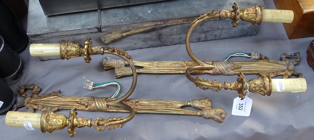 A pair of Continental gilt-brass twin wall lights, height 38cm