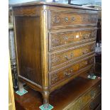 A French carved oak 4-drawer chest, on scrolled feet, W86cm, H83cm