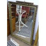 2 modern gilt-framed wall mirrors